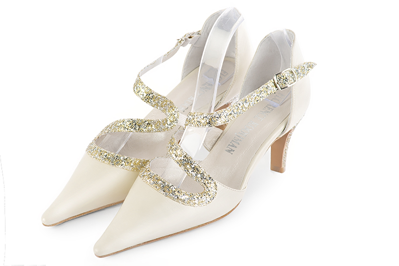 Off white and gold women's open side shoes, with snake-shaped straps. Pointed toe. Medium slim heel. Front view - Florence KOOIJMAN